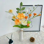 Gehaakt boeket met leliebloemen, pioenrozen, rozen, tulpen en madeliefjes van katoendraad