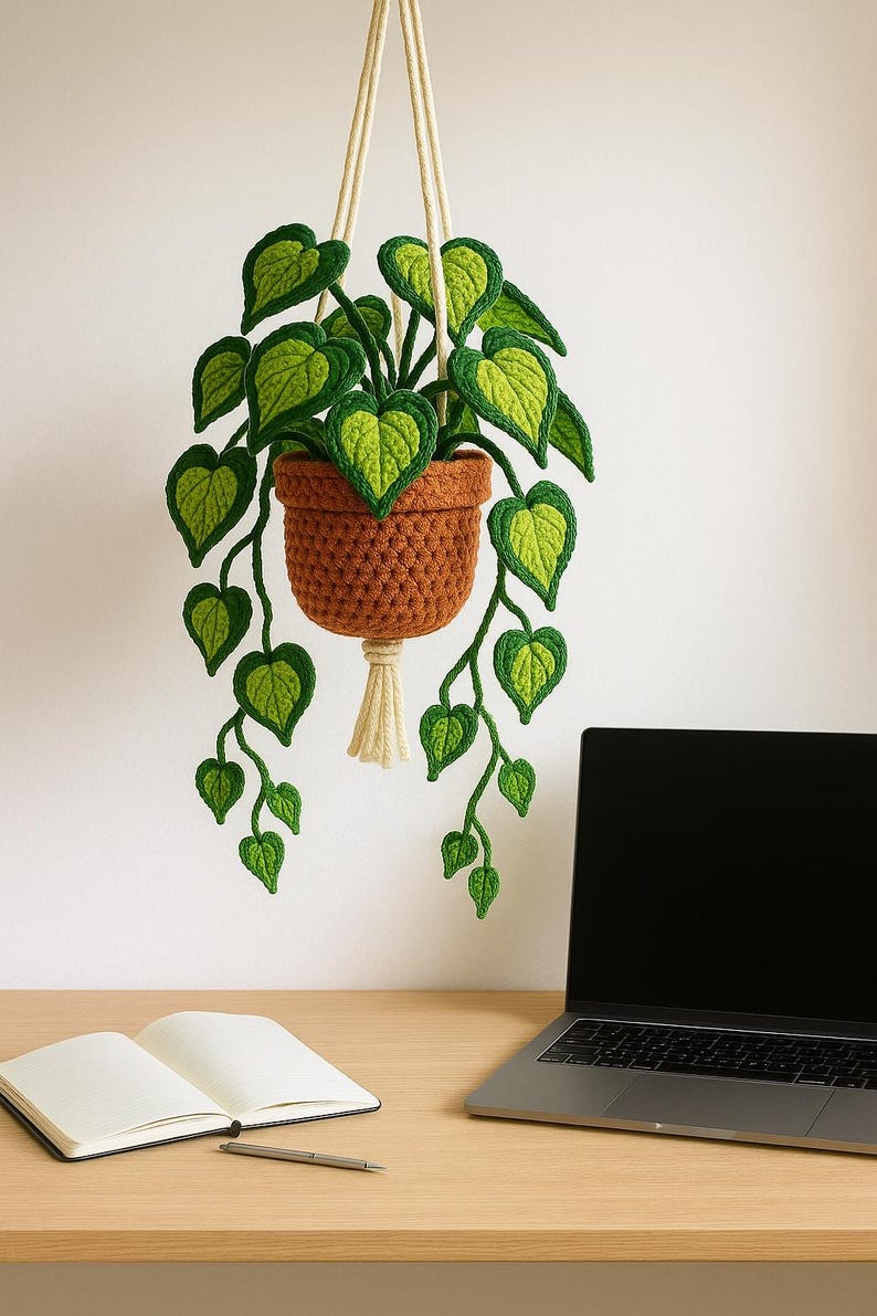 Gehaakte hangmand met hartvormige bladeren en bloemen voor planten, handgemaakte wanddecoratie