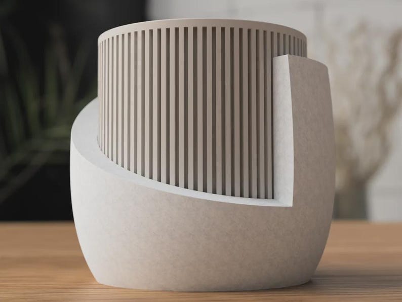 Moderne plantenbak van 3D-geprint PLA met drainagegaten en opvangbak