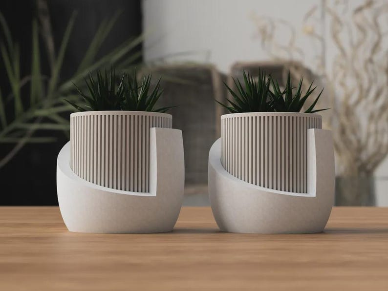 Moderne plantenbak van 3D-geprint PLA met drainagegaten en opvangbak