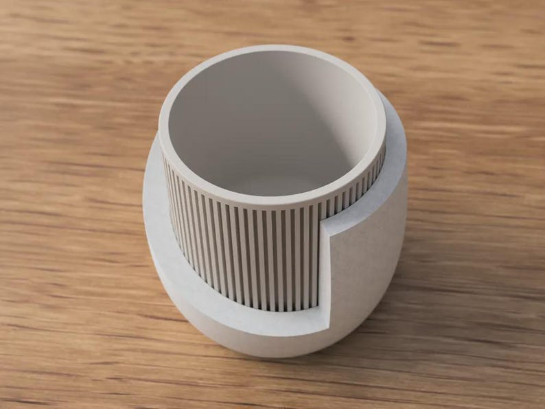 Moderne plantenbak van 3D-geprint PLA met drainagegaten en opvangbak