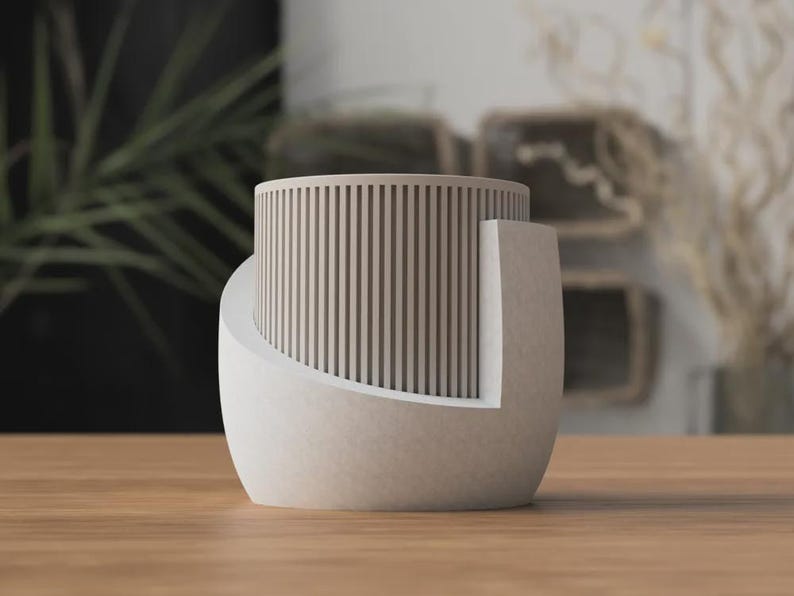 Moderne plantenbak van 3D-geprint PLA met drainagegaten en opvangbak
